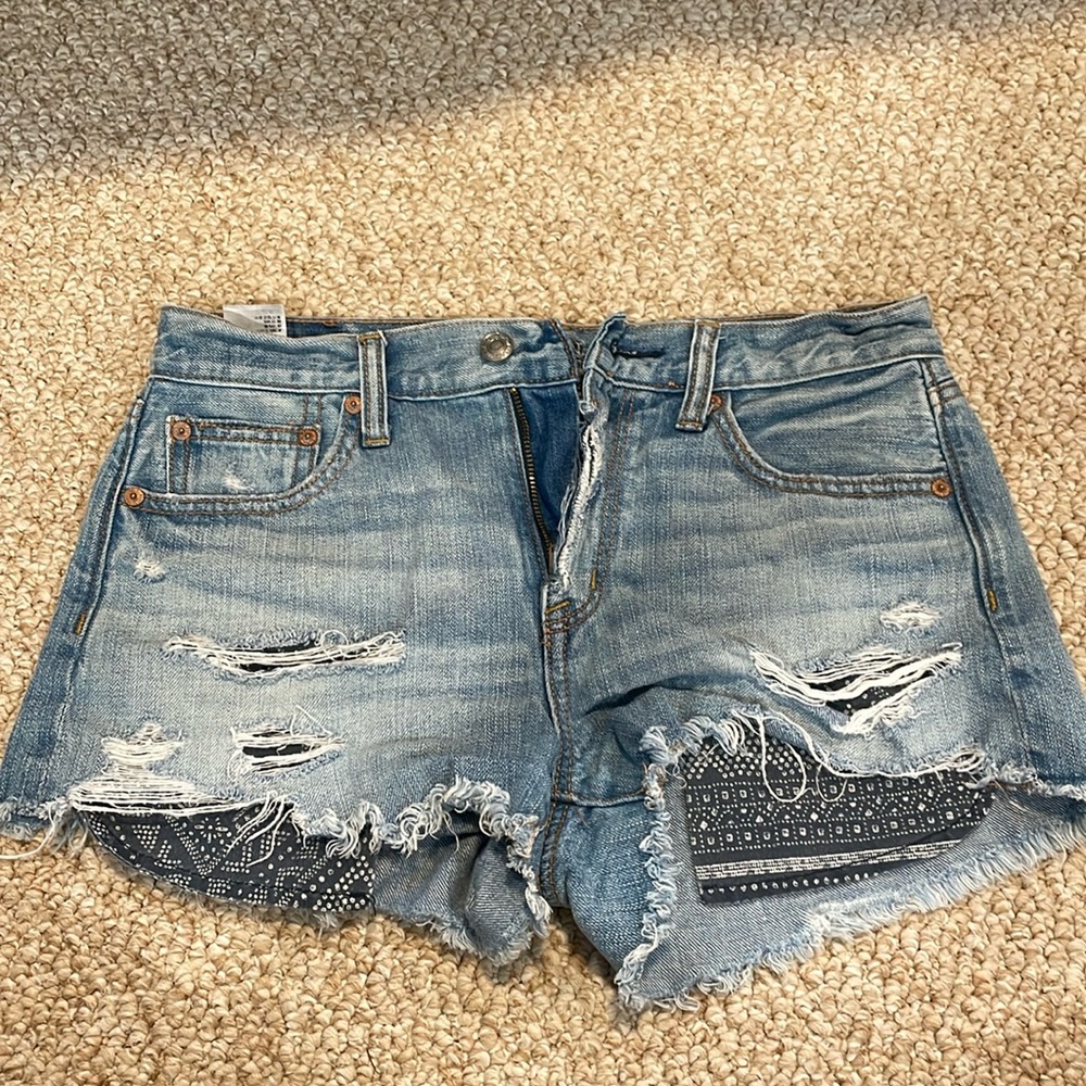 American Eagle distressed festival jean shorts